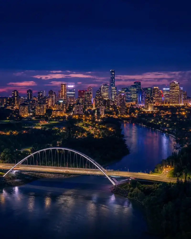 Edmonton skyline, river valley, and bridge at night