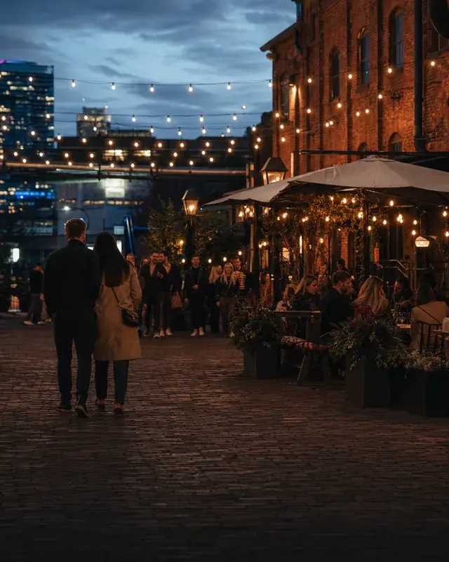 Distillery District cobblestone lane and restaurant patios at night
